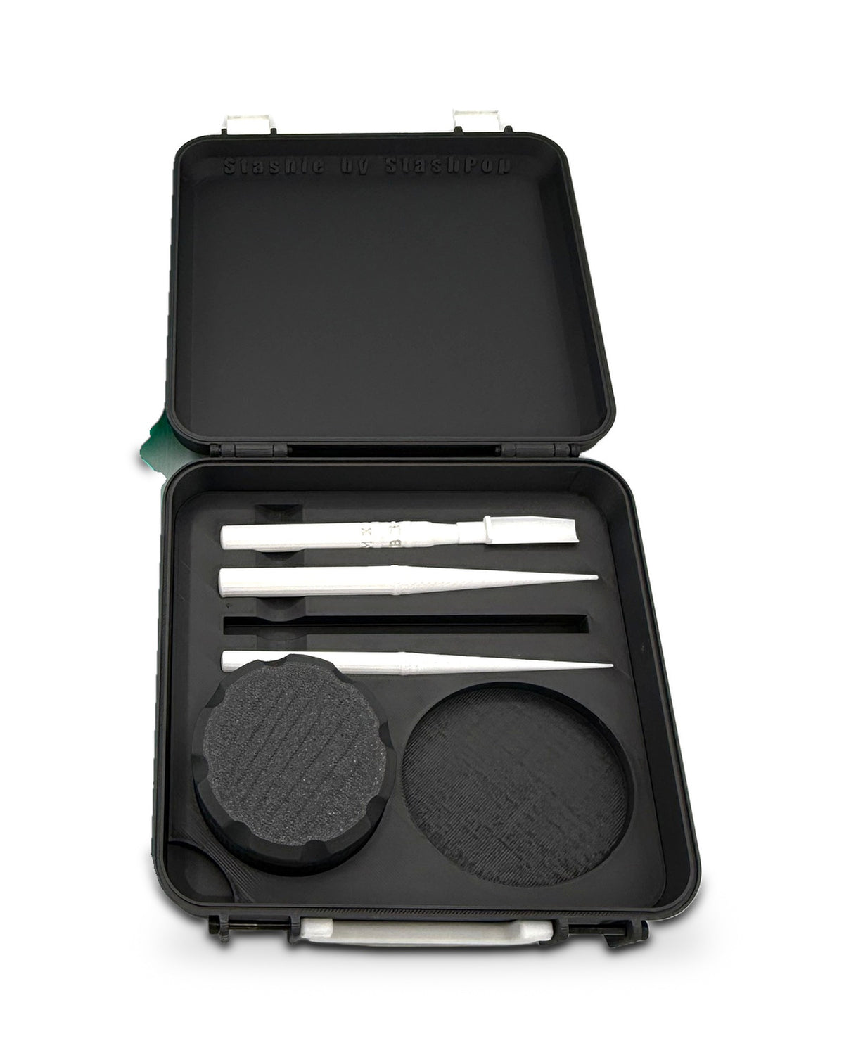 Black STASHIE case, open, with the tool insert