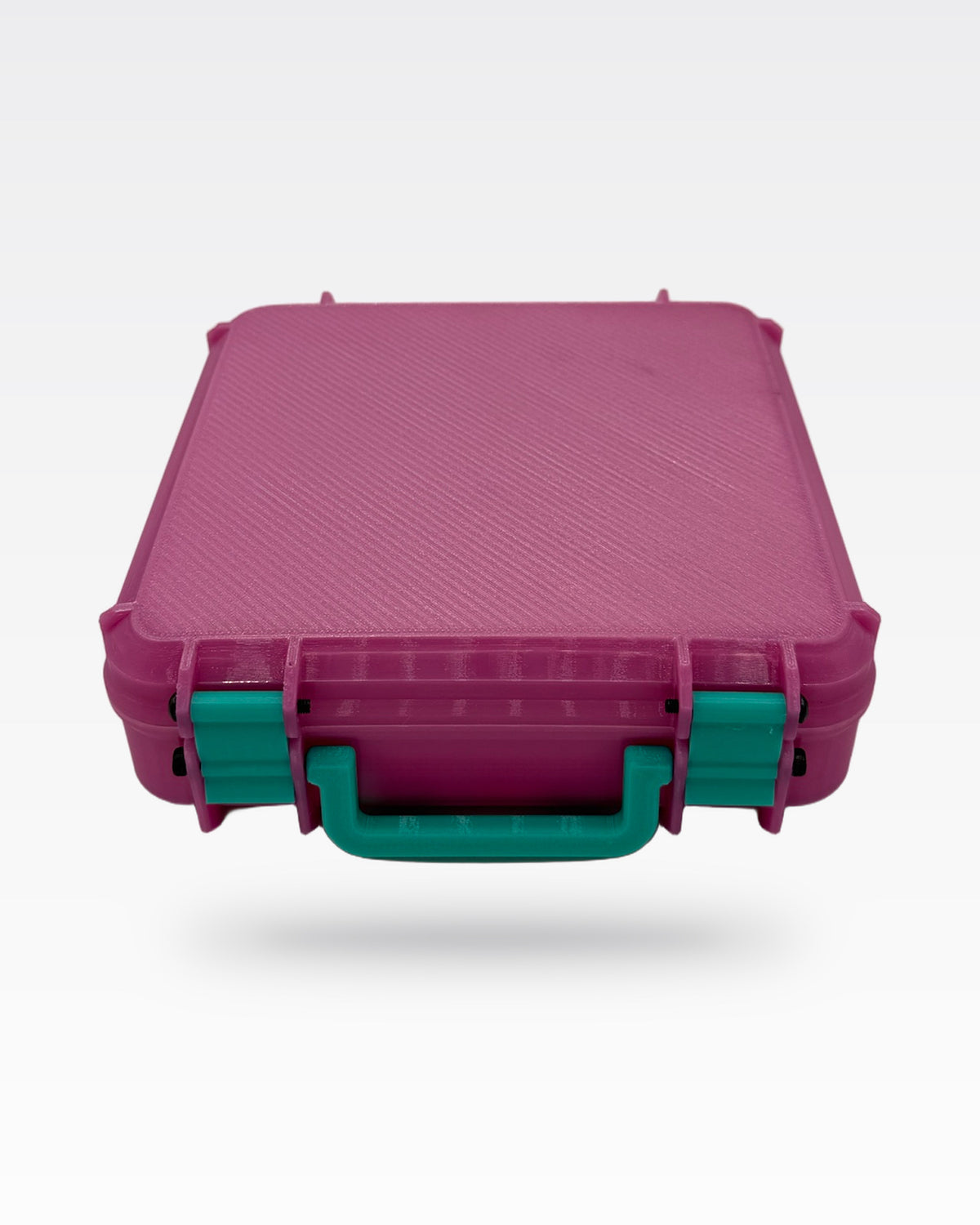 Bubblegum STASHIE: hot pink case with teal latches and handle, front
